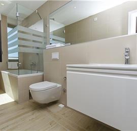 5 bedroom beachfront villa with heated pool near Omis, sleeps 9